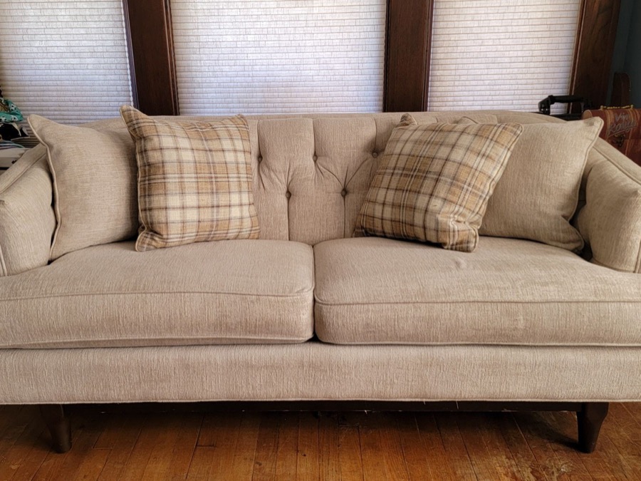 Tufted sofa ready for furniture removal and haul away in Sioux City